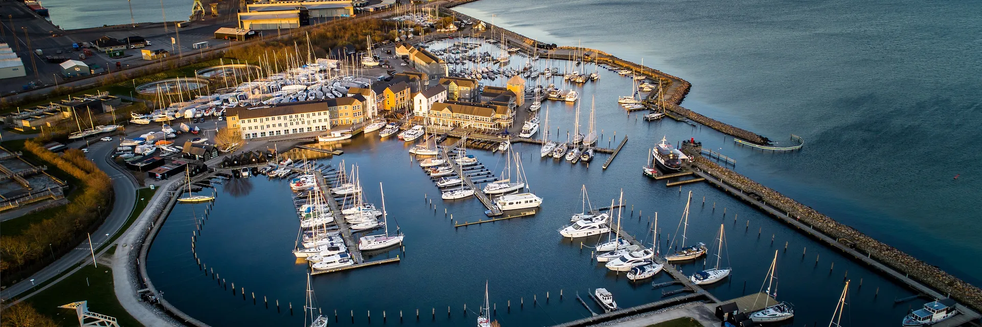 Aerial view of a marina full of yachts