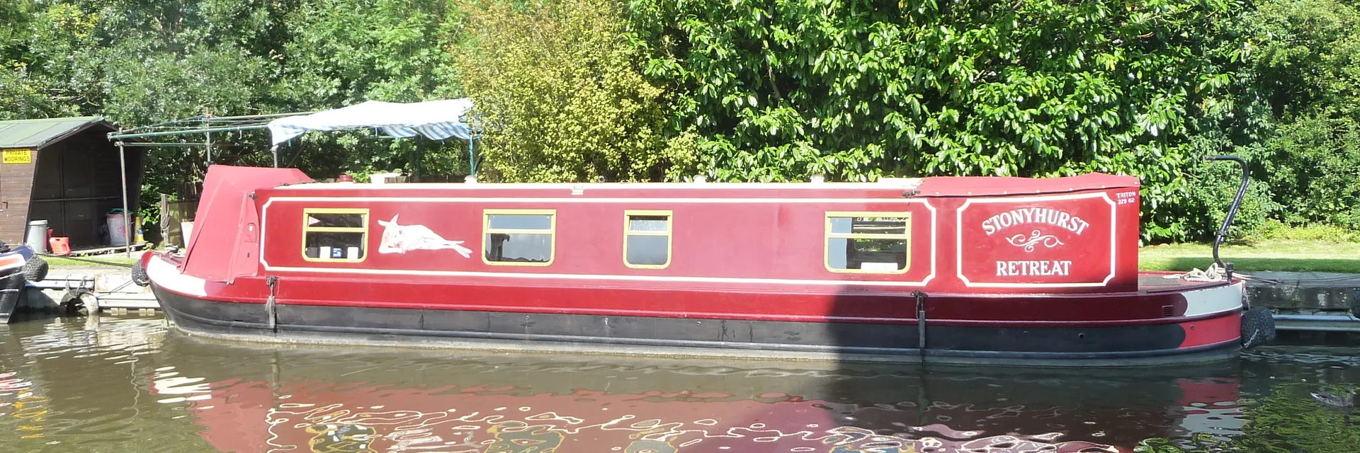 A narrowboat moored on a canal